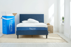 the Haven mattress on a bed next to the box